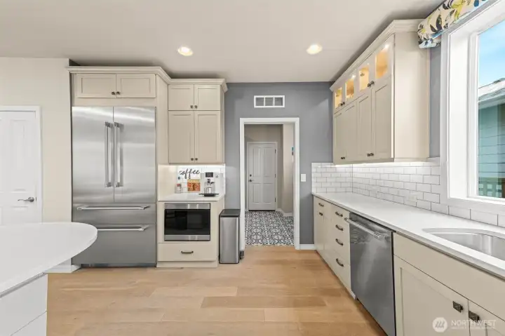 tons of natural light pours in with mudroom and pantry off the kitchen
