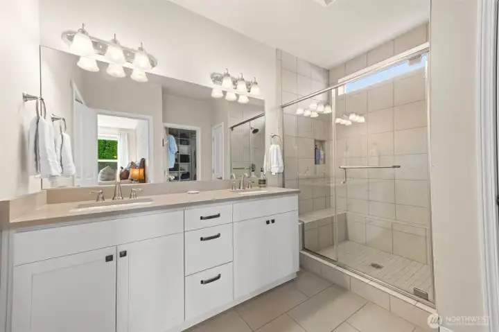 double vanity with tile surround shower