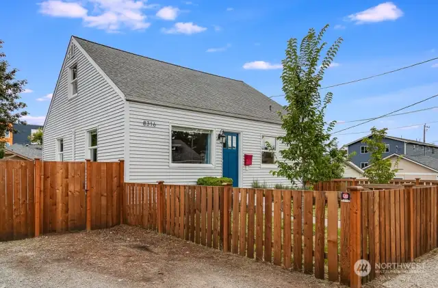 Front of home showing upper level an off-street parking spot