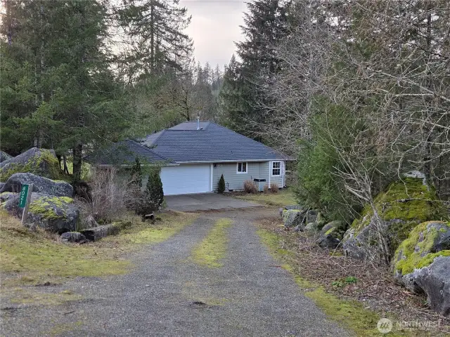 Spectacular property, tucked in private setting with separate access to Shop Building area.