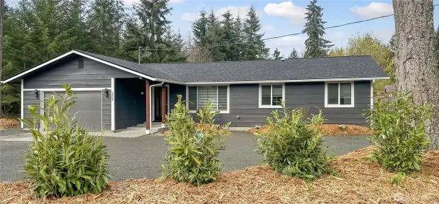Freshly landscaped, new roof, windows and paint.  Just move in and enjoy.