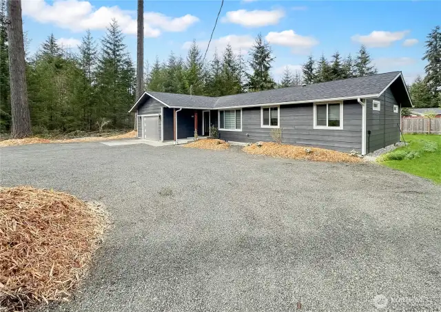 Circular driveway offers lots of parking and easy in and out access.