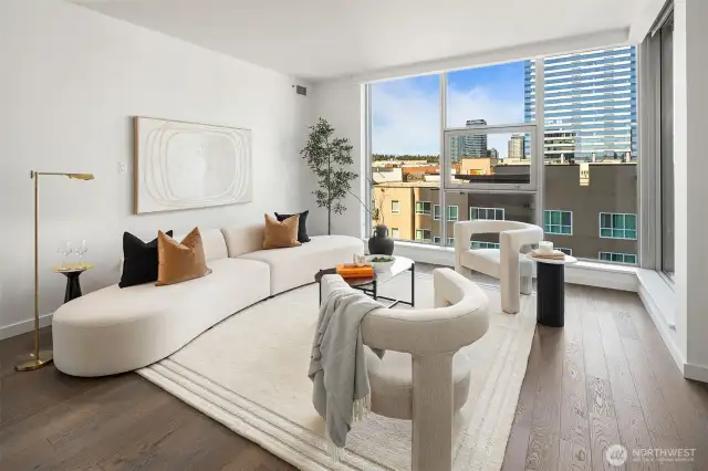 Floor to ceiling windows provide a light filled room