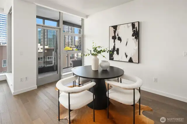 Dining room can fit an even larger table without feeling cramped