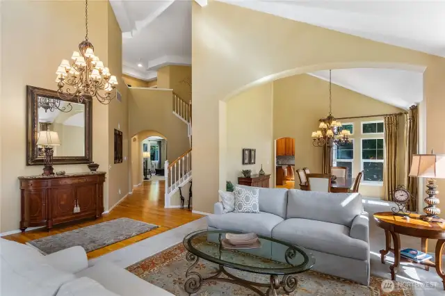 From the impressive foyer with soaring ceilings you can see into the informal living area which is beyond the staircase.