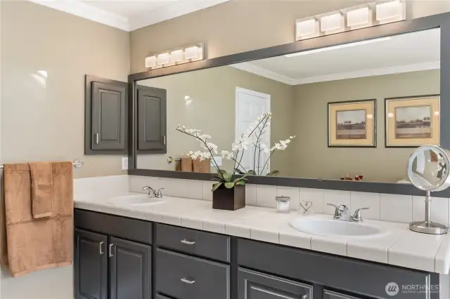 Stylish lighting and mirror make this the perfect space to start your day.