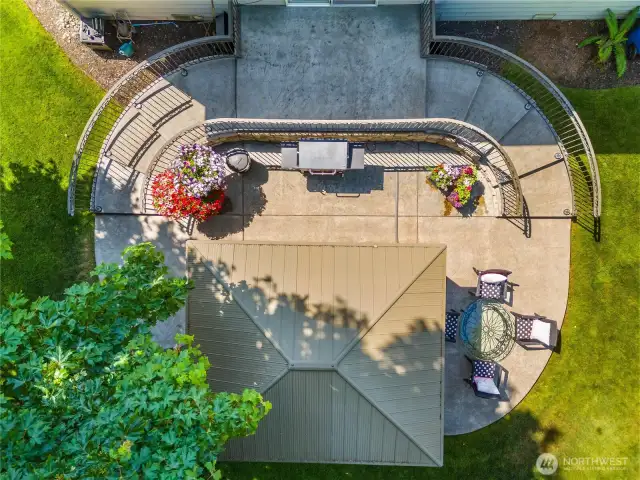 Aerial view of the patio with space to grill, dine and relax in comfort and becomes an open-air extension of the home.
