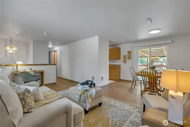 Great room open to multi-level decking with lake views.