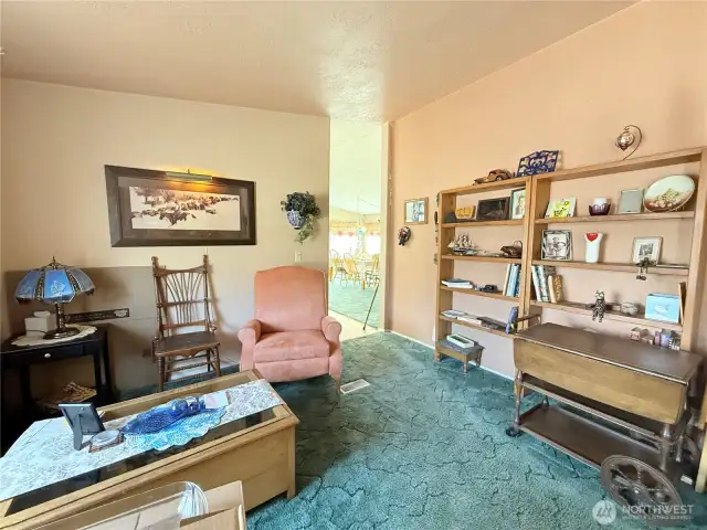 Sitting room headed towards dining area