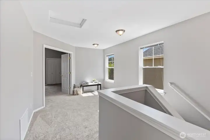Extra Large loft at the top of the stairs can accommodate home gym equipment, desk for work from home, daybed, cozy reading nook. All with incredible south-facing windows natural light.