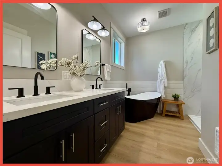 Relax in the spa-like primary bathroom