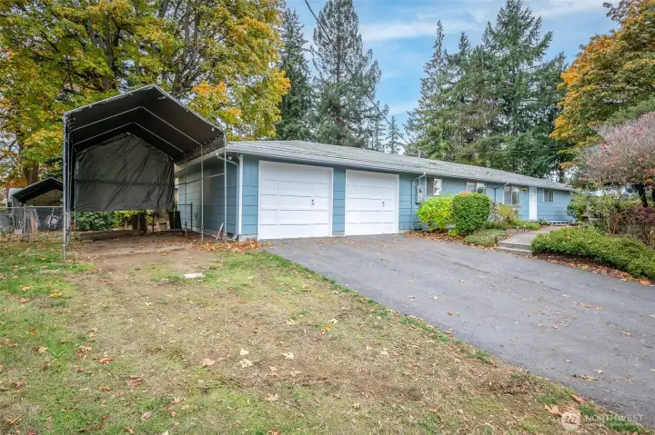 Enjoy the large two car garage plus RV parking and plenty of off-street parking