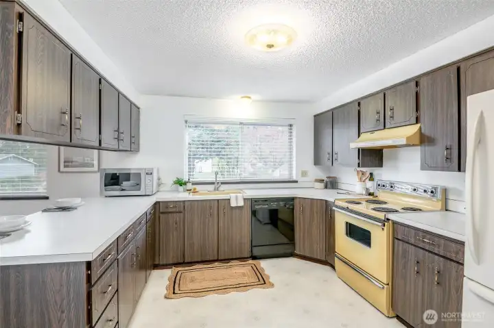 Enjoy the ease and function of this kitchen - with original sink and range/oven!