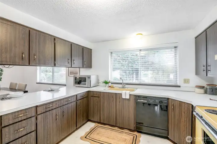 There is plenty of counter space in this kitchen for all your gatherings and cooking needs