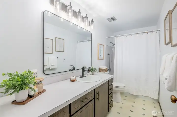Enjoy the tasteful upgrades made in this full bathroom