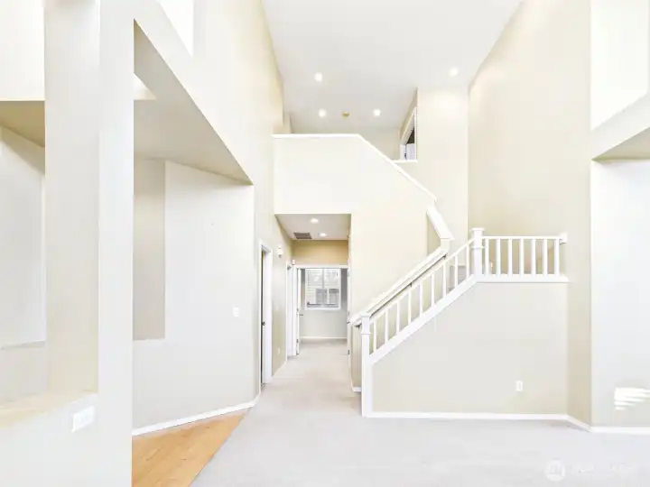 Entry and stairs to more living.