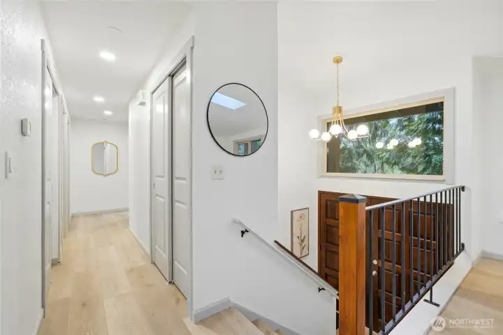 Shaker doors and trim throughout the main floor, high ceilings, luxury vinyl plank flooring