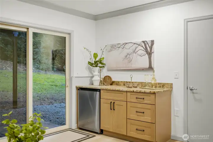 Dry bar with beverage refrigerator, granite countertop