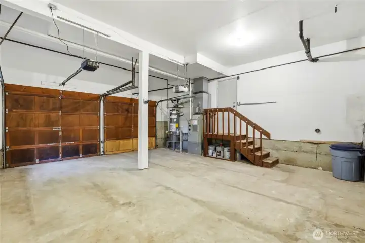 Spacious two-car garage with man-door to the backyard. Gas furnace and gas hot water tank.