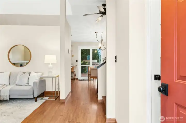 View of of the entry toward the dining room and kitchen - notice the large entry closet ready to take your guests coats - or yours!