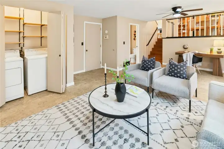 The laundry area is easy to get to an can be closed off when you want to tuck it away