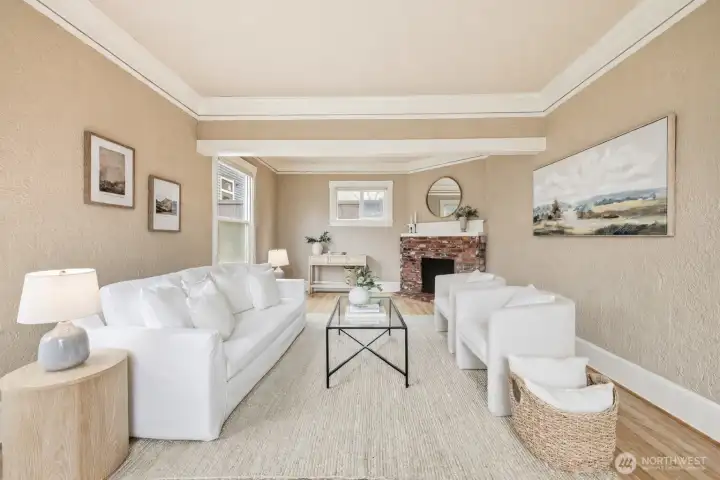 Spacious living room with easy flow into the entry and dining room, ideal for everyday living and entertaining.