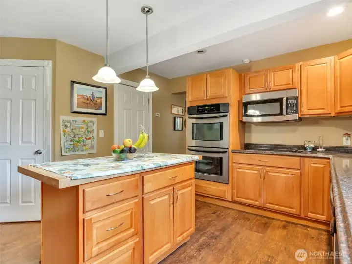 Great storage with plenty of cabinets, a large pantry, and utility closet.