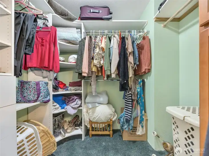 Walk-in closet off of the primary bath