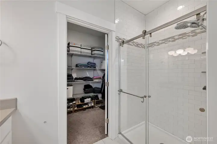 Tile shower in primary ensuite. Tile shower in primary ensuite.