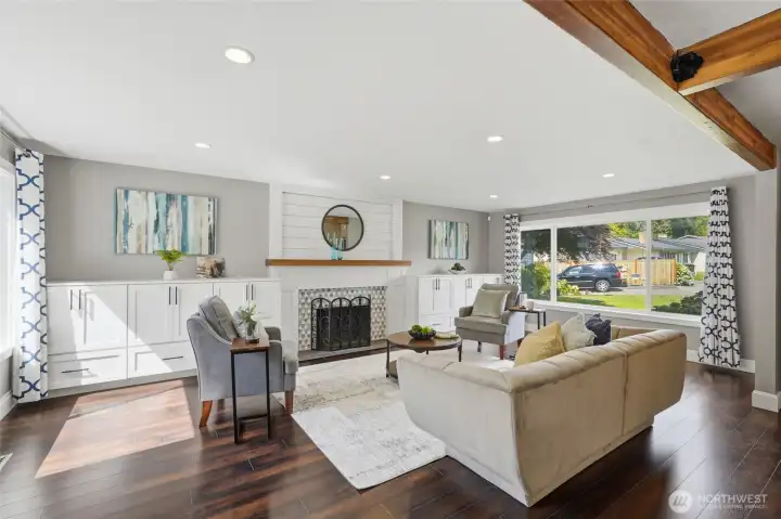Spacious living area with abundant natural light, and plenty of room for gathering and entertaining.