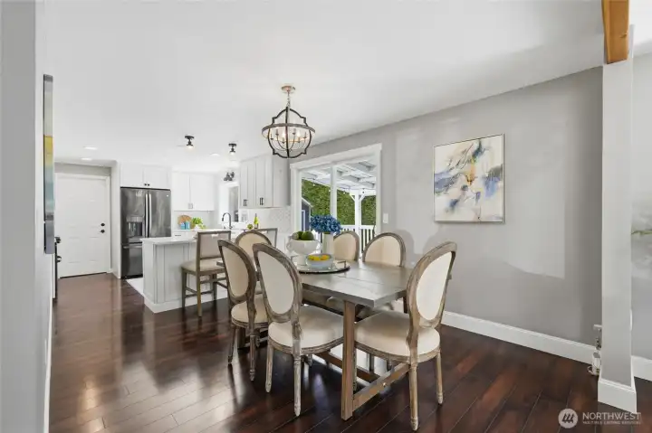 Open dining space with easy access to the covered deck for indoor-outdoor entertaining.