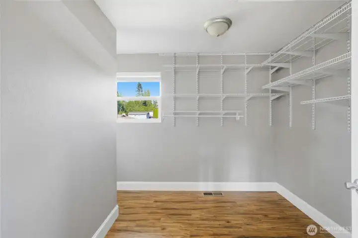 Spacious walk-in closet adds functionality and supports use as a potential primary suite.