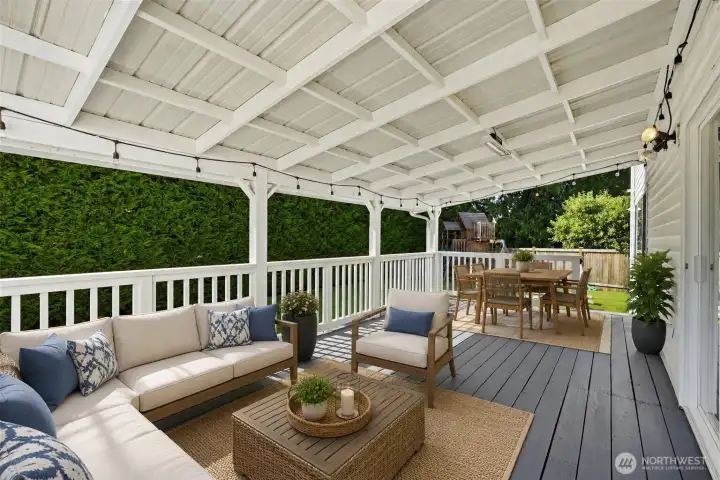 Step outside to a spacious covered deck with string lighting, creating the perfect spot for year-round outdoor dining, entertaining, or simply relaxing.  Virtually Staged.