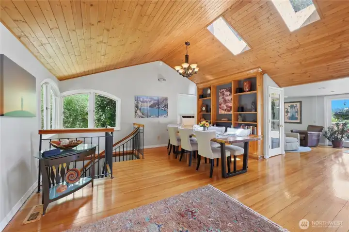 Tongue and Groove vaulted ceilings with skylights and gleaming firwood flooring sets the stage. Tongue and Groove vaulted ceilings with skylights and gleaming firwood flooring sets the stage.
