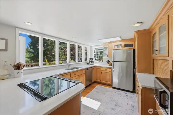 East facing windows in the kitchen and skylight bring in the natural light. East facing windows in the kitchen and skylight bring in the natural light.