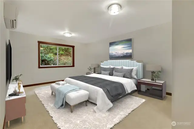 Primary Oversized bedroom to the back of the home, with its own heating and air conditioning. On suite and walk in closet to the right.