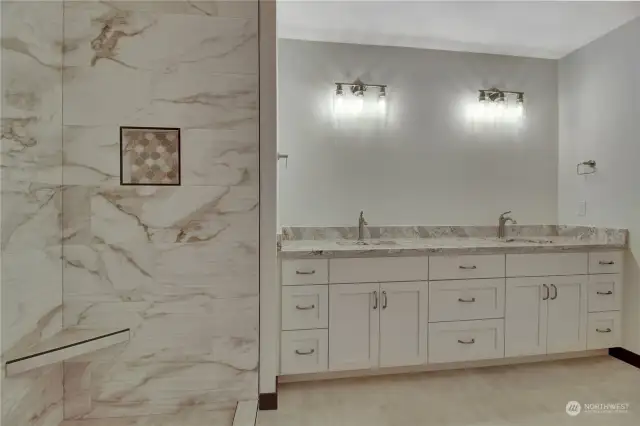 This beautiful layout is versatile and spacious. Mirrors have been installed and completed the space.