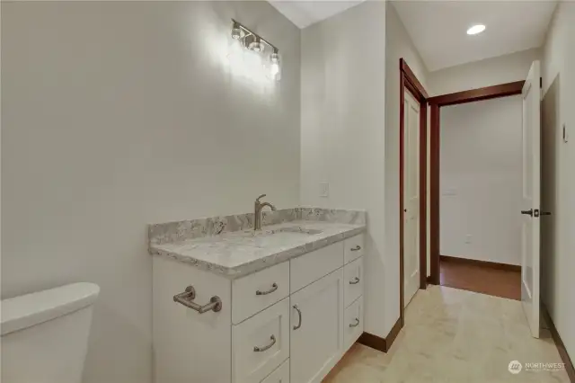 Mirror has been hung! There is the storage closet for all your extras right by the exit door.