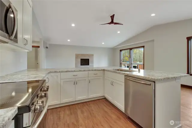Kitchen space from the far corner with a great view into the living area