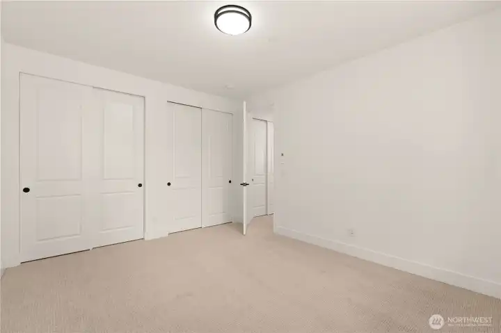 Dual closets in the lower level bedroom