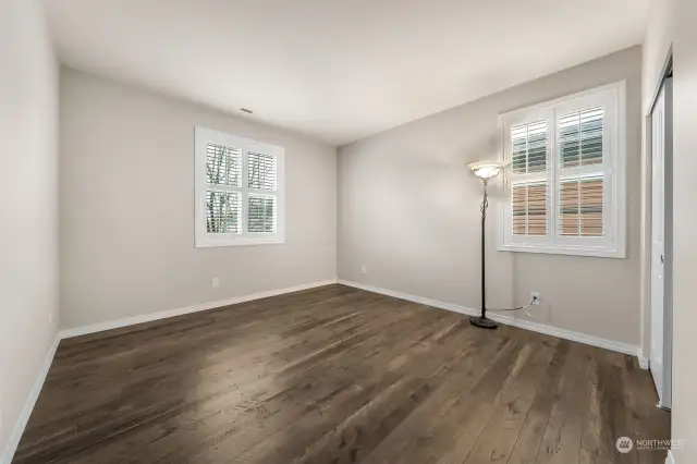 Guest bedroom with custom shutters