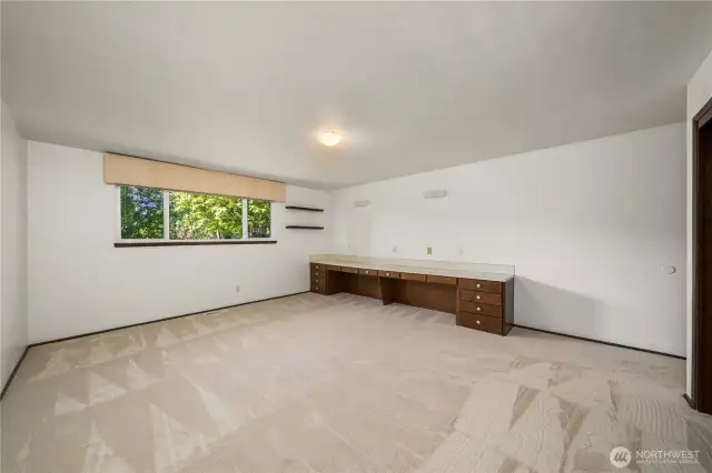 The second bedroom is so large maybe convert part of it to a home office?