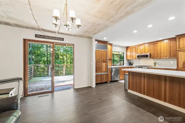 Dining area with sliding glass door leading out to deck