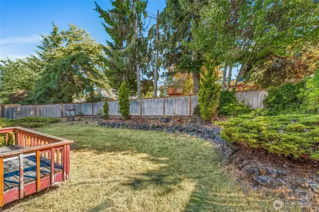 The fenced back yard provides privacy, and safety for little ones and pets.