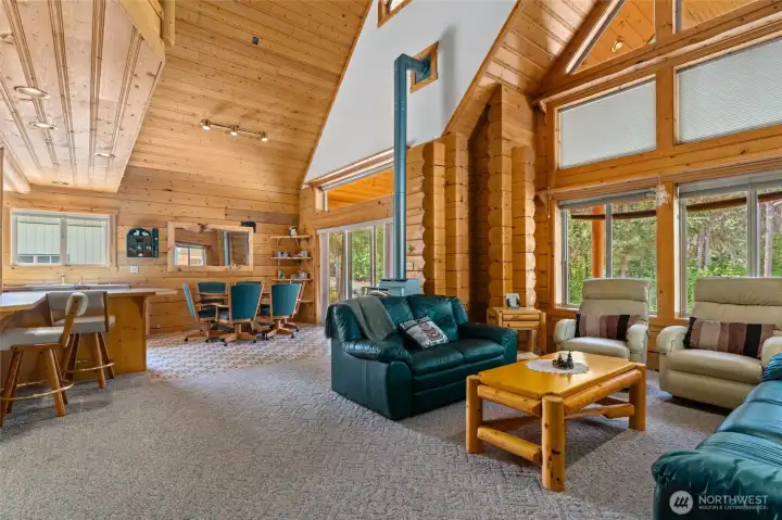 Come on in to your open living area with vaulted ceilings and large windows.