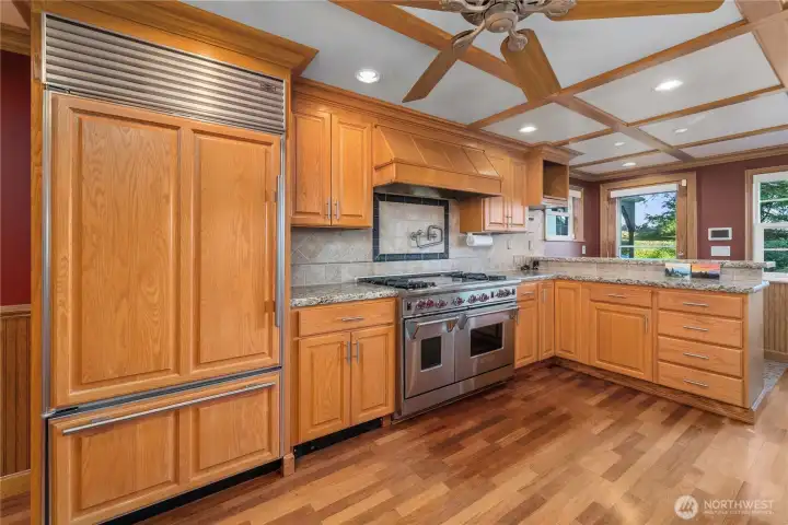 You will LOVE this beautiful kitchen with the double Wolf stove/ovens, the convenient pot filler, and the matching sub-zero refrigerator. The mountain views are amazing from here as well.