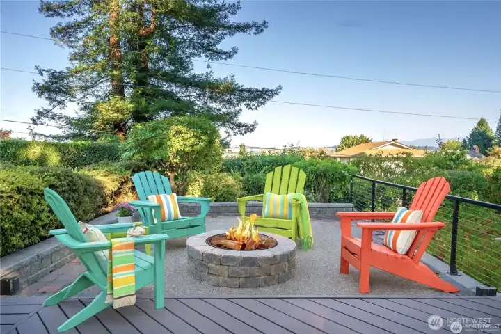 There's a stunning full view of Mount Rainier from here just to the right of this photo. Relax around your firepit or entertain friends, there's plenty of room for everyone here.