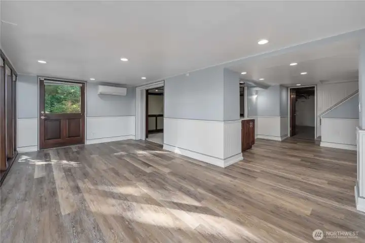 Here's the flex room downstairs, all of the windows and doors have top down/bottom up blinds, with a 3/4 bath to the right of this photo.