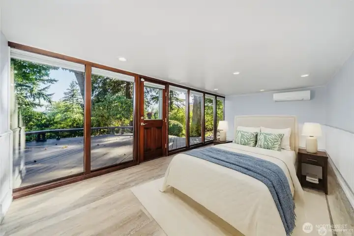 Flex room virtually staged as an additional bedroom if someone wanted to use it that way. There is a 3/4 bath located just off of the flex room.