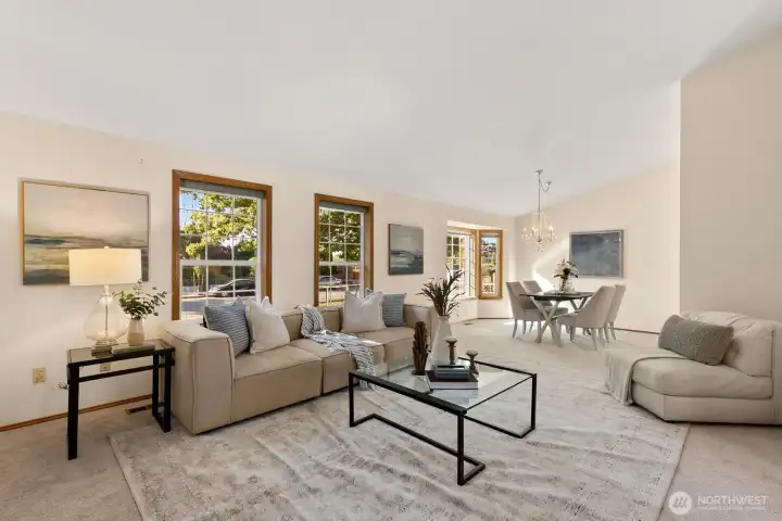 Main living & dining area offers great natural light and vaulted ceilings.